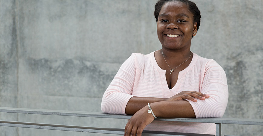 Tomanike Banks will receive a bachelor's degree in public health on May 12, then a month later her journey will take her to Sierra Leone with the Peace Corps.